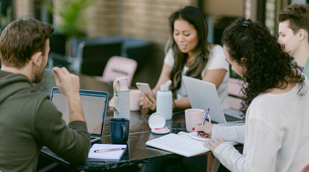 People talking at a conference table